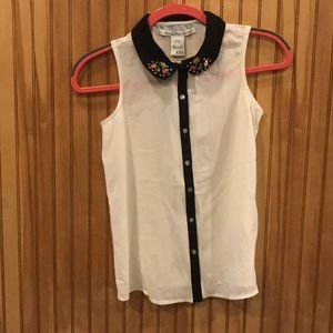 Cream button up sleeveless blouse
